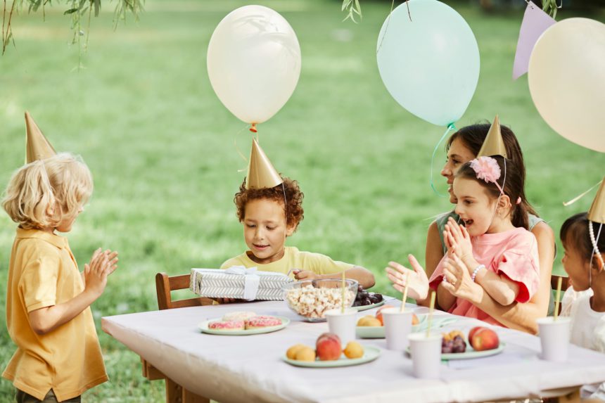 Children Enjoying Birthday Party in Summer